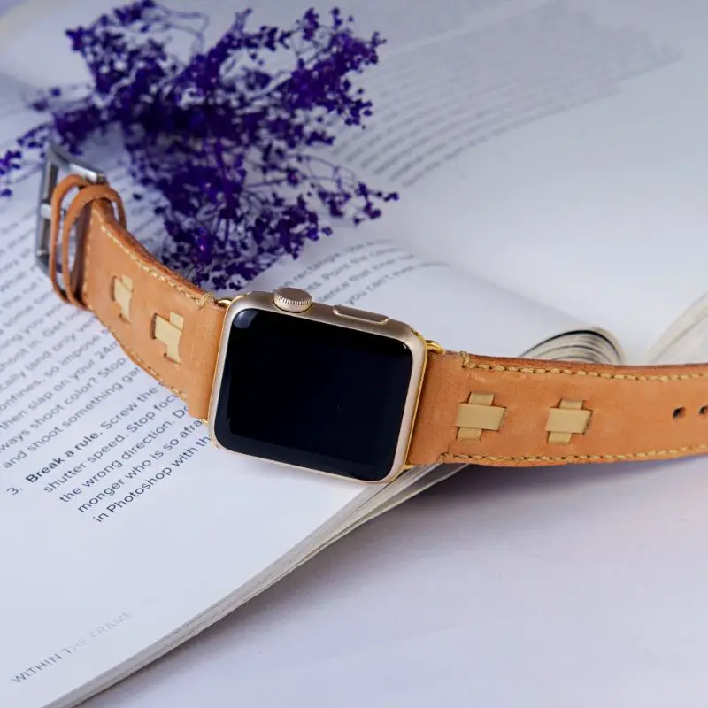 leather apple watch band and book