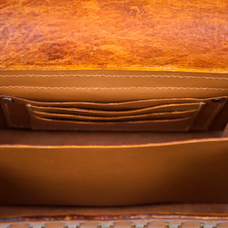Brown crossbody mini purse pockets closeup