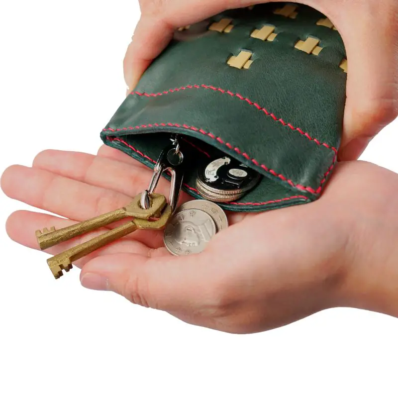 green coin purse hands