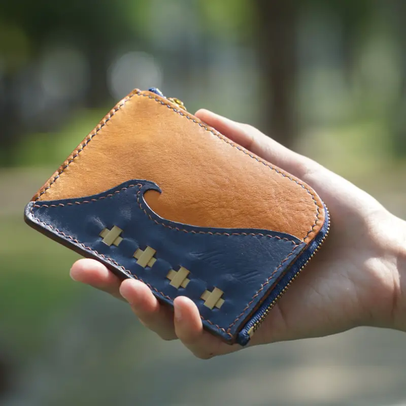 l shaped wallet in hand