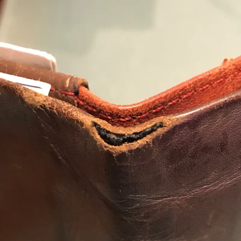 torn leather seam